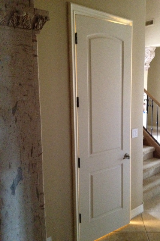 custom iron door on wine cellar remodeling design/build phoenix az