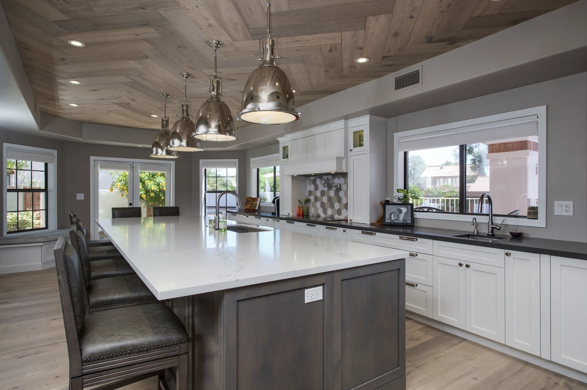 All-In whole house transformation featuring full custom cabinetry, premium natural stone, and integrated lighting throughout by Hochuli Design and Remodeling Team